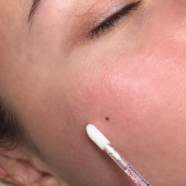Beauty mark tattoo result by Kate Dark